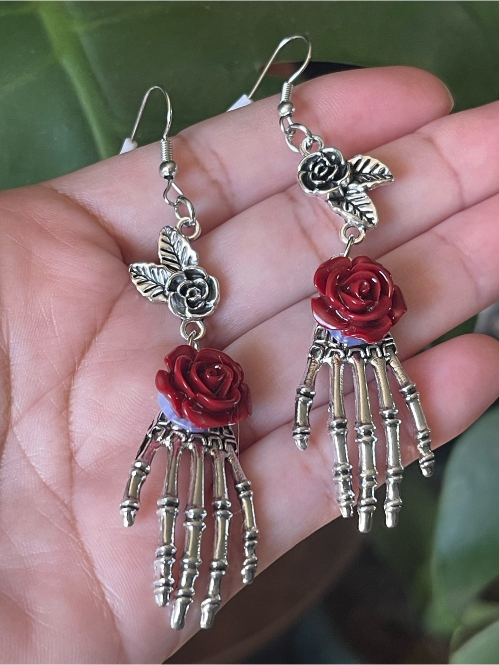 Silver Skeleton Hand Earrings with Red Rose